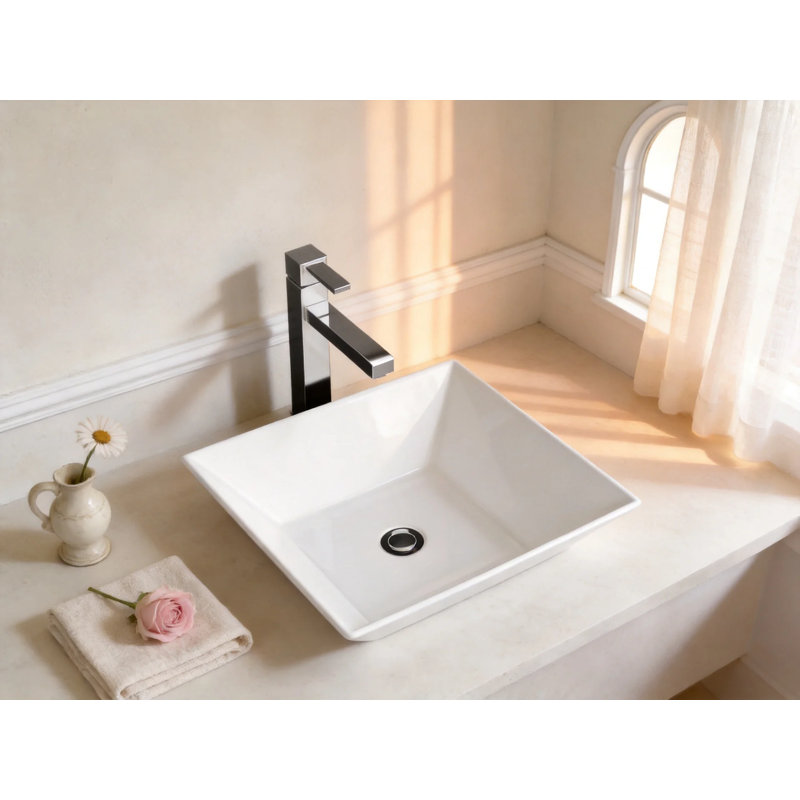 Vasque carrée en porcelaine vitrifiée blanche 40,6 x 40,6 cm (16 po x 16 po), à poser sur un meuble-lavabo avec bonde de 4,4 cm (1,75 po).