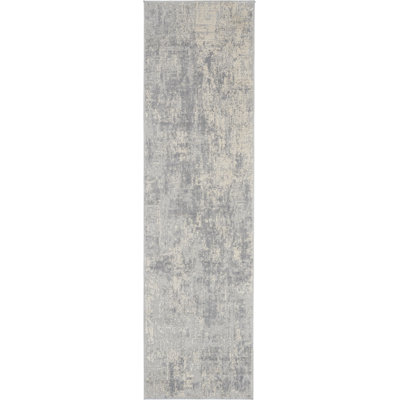Tapis abstrait gris tissé à la machine