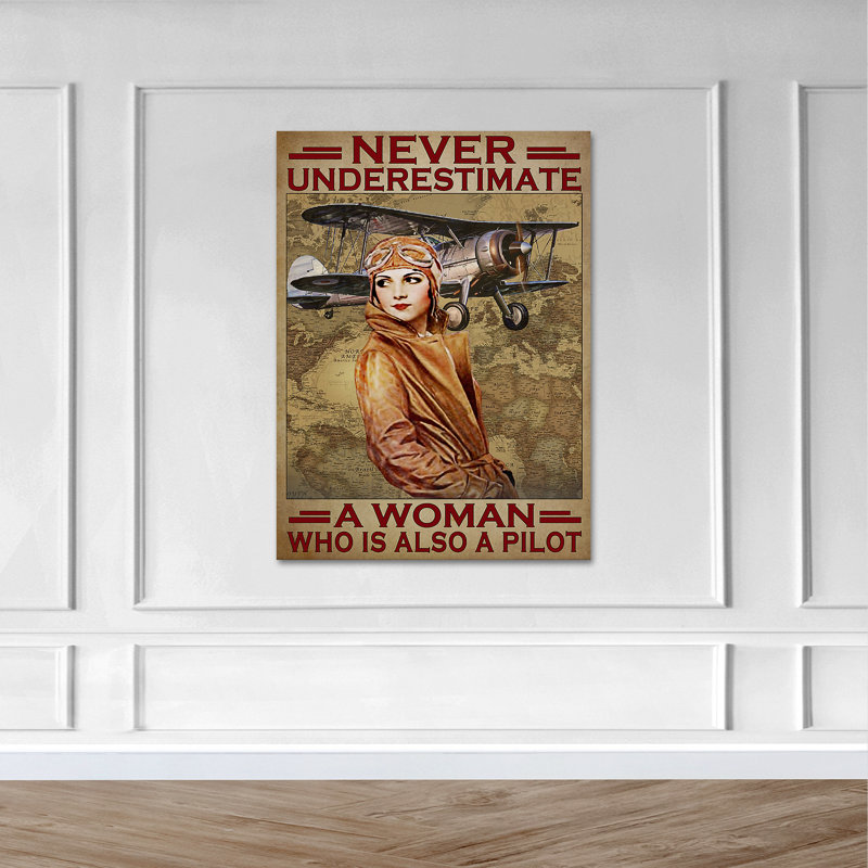 Un pilote avec un manteau jaune - ne jamais sous-estimer une femme sur toile tendue - décor d'illustration de personnes, décor de salon jaune