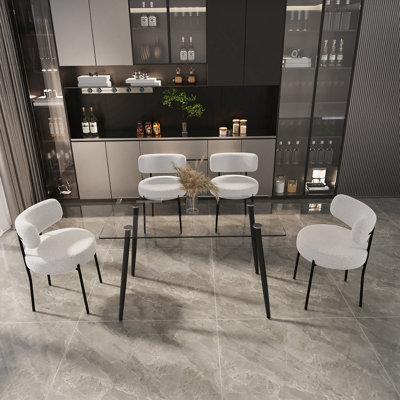 Ensemble de table de salle à manger avec pieds en métal et chaises en velours, idéal pour les repas en famille et pour recevoir des invités dans des espaces de salle à manger élégants