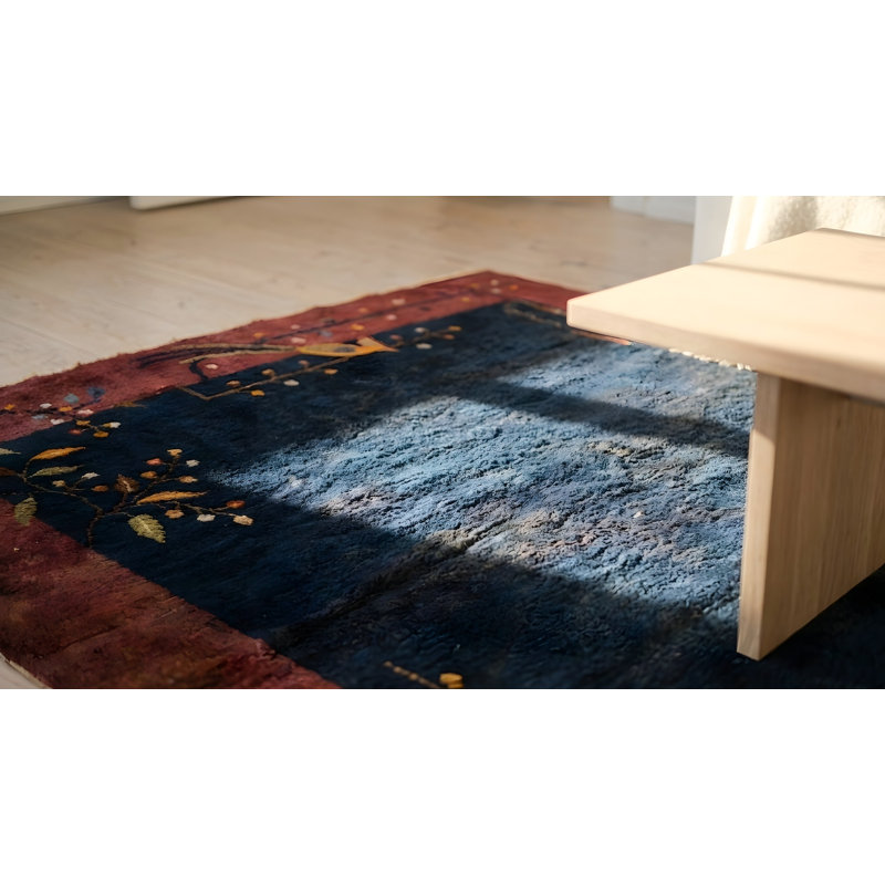 Tapis bleu antique en laine à motif oiseau minimaliste