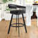 Robinett Swivel Counter or Bar Height Bar Stool with Arms and Footrest in Faux Leather and Metal