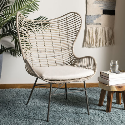 Fauteuil à oreilles en rotin Kailin