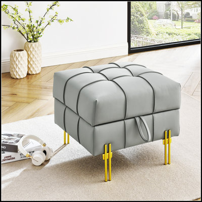 Repose-pieds rectangulaire capitonné en cuir rembourré avec des bords lisses et une conception compacte pour le confort et l'efficacité de l'espace