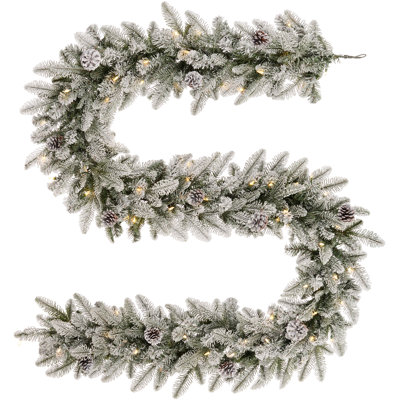 Snowy Stockbridge Pre-Lit 9 Foot. Flocked Garland with Twinkle Lights and Silver Glitter Pinecones