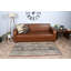 Tapis turc vintage fait à la main dans des tons terreux avec des motifs complexes pour un décor de salon confortable