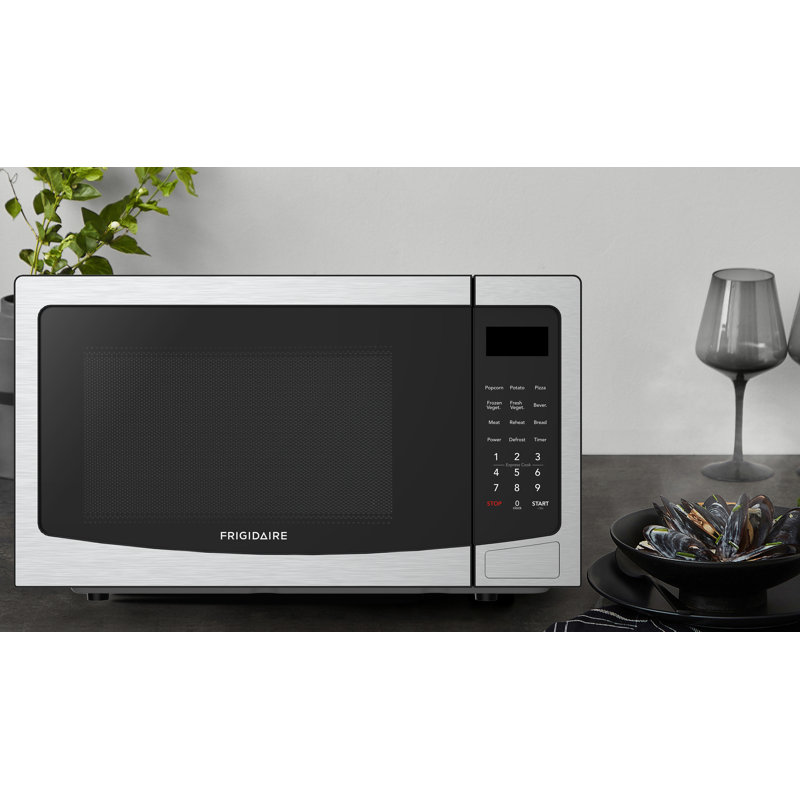 Frigidaire 1.1 Cu. Ft. Stainless Steel Countertop Microwave Oven, 1000W Microwave with 10 Power Levels, 6 Quick Cook Menus, Express Cook +30 Sec, Weight & Speed Defrost, LED Display