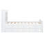 Lit simple avec prises de tête de lit et espace de rangement pratique