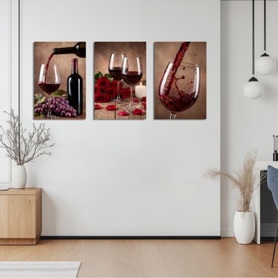 Ensemble de 3 tableaux sur toile représentant un vin rouge versé avec des raisins, des roses et une bougie