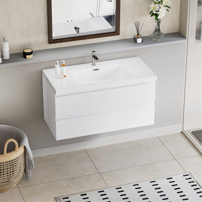 Meuble-lavabo flottant avec lavabo, mural et peu encombrant, idéal pour la conception et l'organisation de salles de bain modernes.
