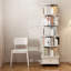 Bibliothèque pivotante blanche avec roulettes et tiroir