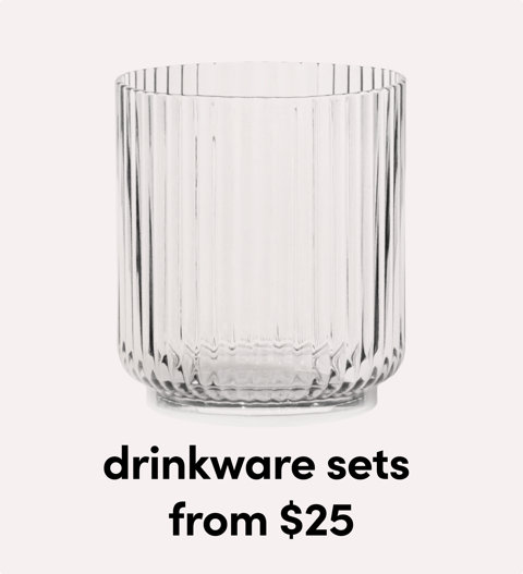 Set of clear ribbed drinking glasses.