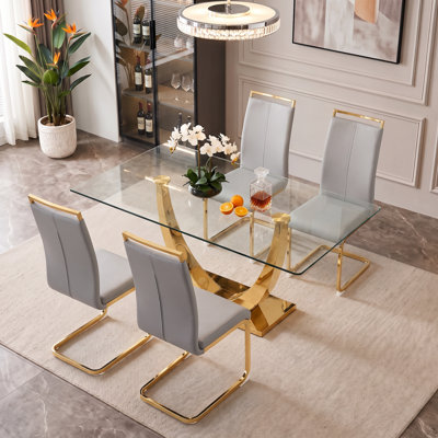 Ensemble de salle à manger 5 pièces rectangulaire moderne en verre trempé avec base en métal et chaises en porte-à-faux en similicuir