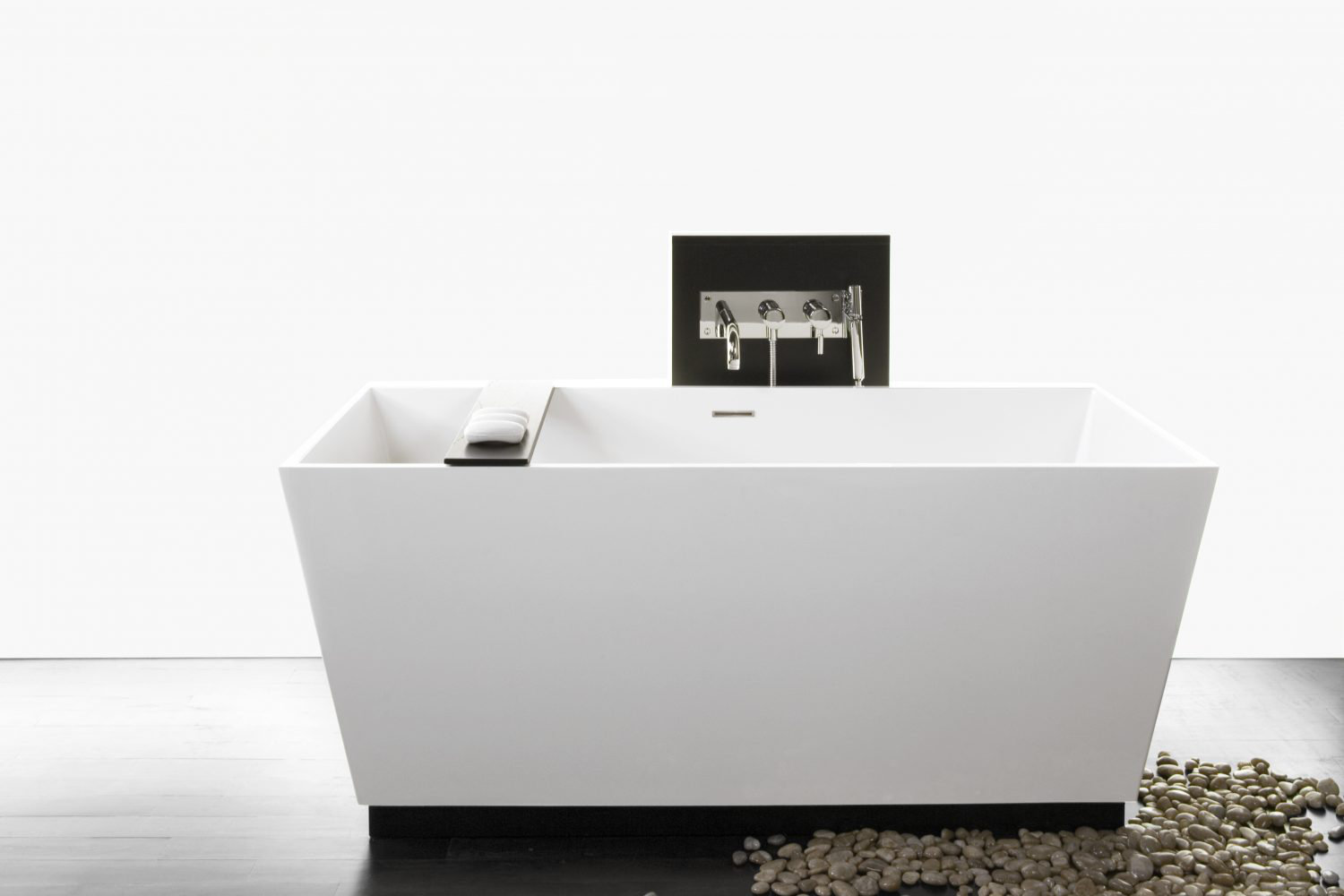 https://assets.wfcdn.com/im/26062378/compr-r85/2517/251754927/cube-freestanding-solid-surface-soaker-tub-with-wood-bridge.jpg