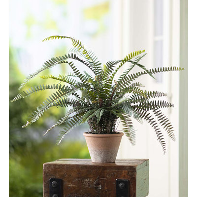 Fausse plante artificielle en pot