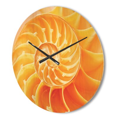 Yellow Nautilus Shell - Modern Wood Wall Clock -  East Urban Home, 72850EF7DA4F497CB178ACA9582C0285