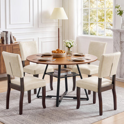 Ensemble de table de salle à manger: table de salle à manger ronde industrielle de 47 po avec pieds en croix et tablette de rangement en filet et chaises de salle à manger rembourrées en bois de style Mid-Century
