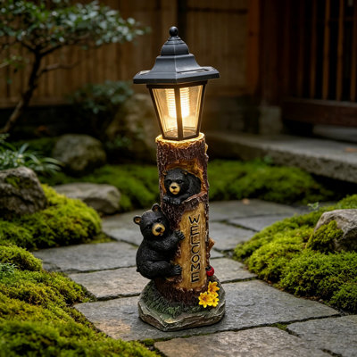 A Brown Bear Statue Welcoming Guests, A Garden Statue With Solar-Powered Lights, A 19-Inch Resin Bear Family In A Tree, And Outdoor Bear Decorations For Courtyards, Gardens, Lawns, And Patios.