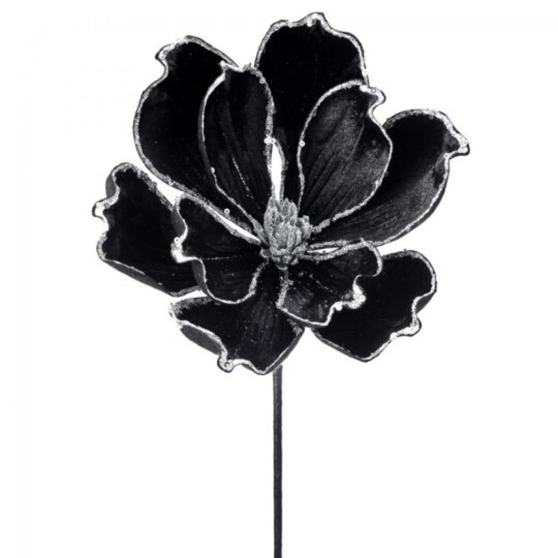 Bouts de paillettes argentées sur une tige de velours de magnolia noir