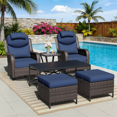 Adcox 2-Person Outdoor Rattan Patio Furniture Set with Swivel Chairs,Headrest Pillows,Ottomans,Tables & Blue Cushions