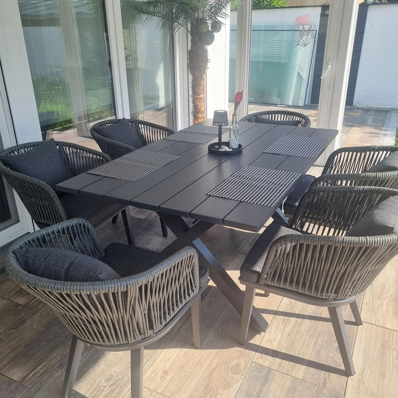 Leylashka 6 - Person Hand-woven Rattan Patio Dining Set with Rectangular Table, Cushions and Pillows