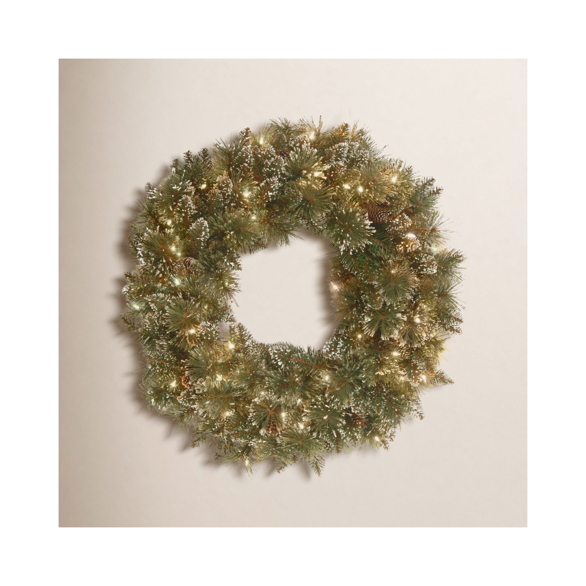 The Holiday Aisle® Glittery Bristle Pine Wreath with Twinkly LED Lights, 5" H x 24" W x 24" D