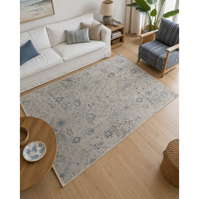 Tapis décoratif gris à motif floral gris et beige