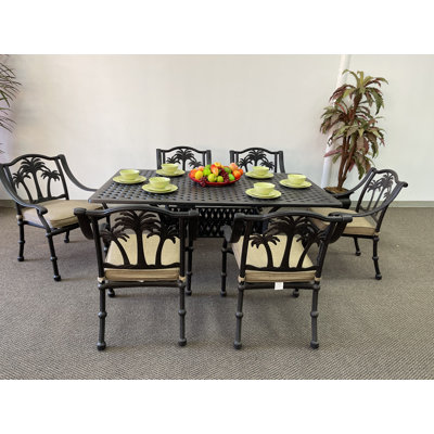 Alesha-Mae 6 - Person Patio Dining Set Umbrella Hole Included Rectangular Table with Sunbrella® Cushions Included