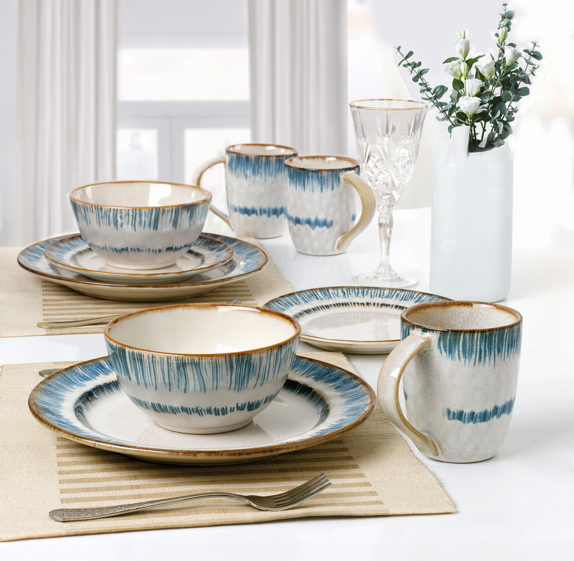 https://assets.wfcdn.com/im/26104498/compr-r85/1692/169226631/lorren-home-trends-stoneware-dinnerware-set-service-for-4.jpg