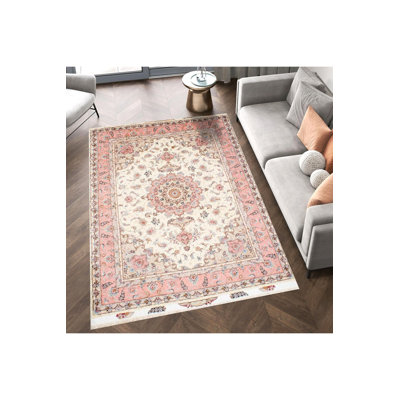 Tapis beige lavable à la machine à motif floral beige