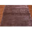 Tapis mauve touffeté à la main