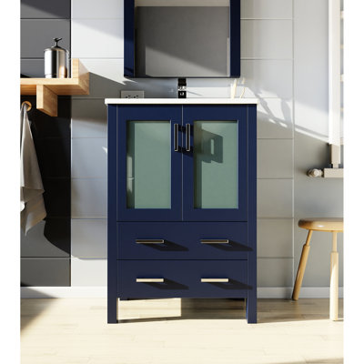 Bleu marine 24 po L x P 18,25 po avec comptoir en céramique blanc, 22 miroirs, équipement à fermeture en douceur, une armoire et deux tiroirs pour les tiroirs de la salle de bain