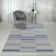 Donnavan Striped Blue Area Rug
