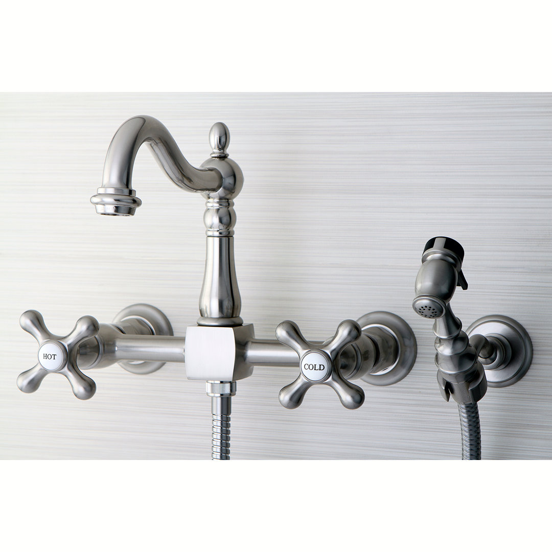 Kingston Brass Heritage Double-Handle 3-Hole Wall-Mount Bridge Kitchen Faucet with Brass Sprayer Kingston Brass 