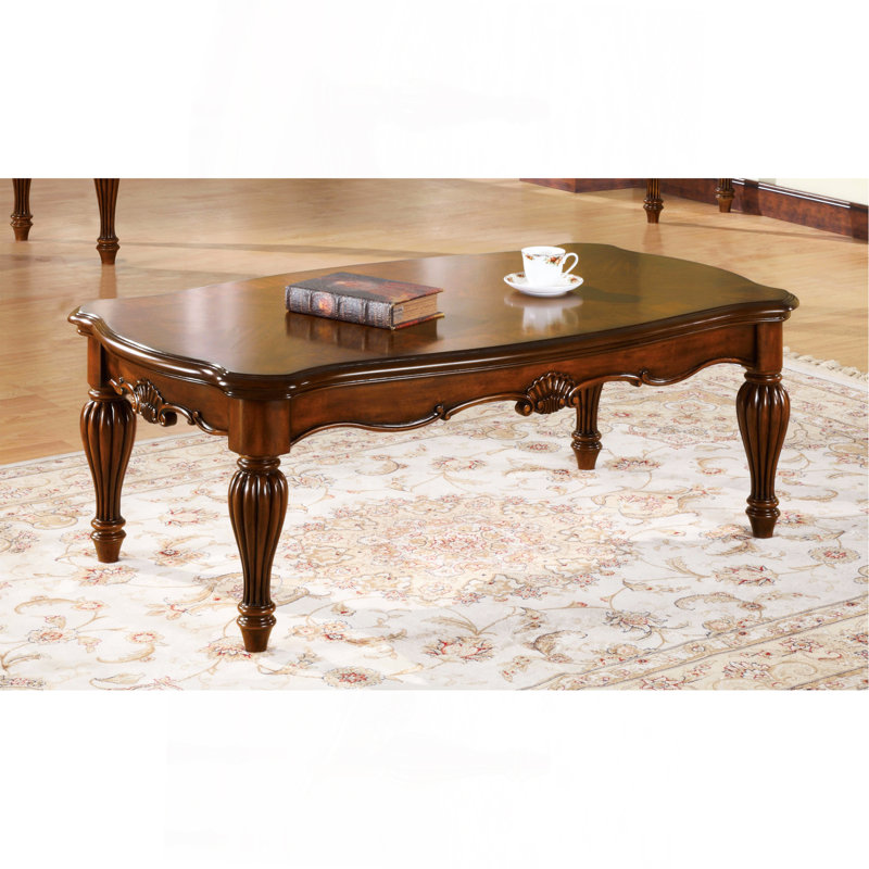 Table basse cerise rectangulaire avec pieds tournés