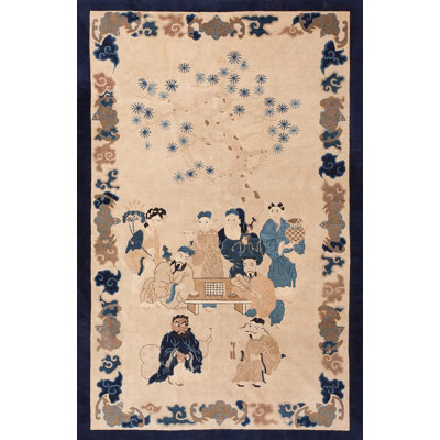 Petit tapis rectangulaire en laine noué à la main de couleur ivoire antique
