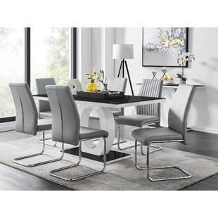 https://assets.wfcdn.com/im/26141707/resize-h310-w310%5Ecompr-r85/1234/123419628/scottsmoor-modern-high-gloss-halo-6-seater-dining-table-set-with-luxury-faux-leather-dining-chairs.jpg