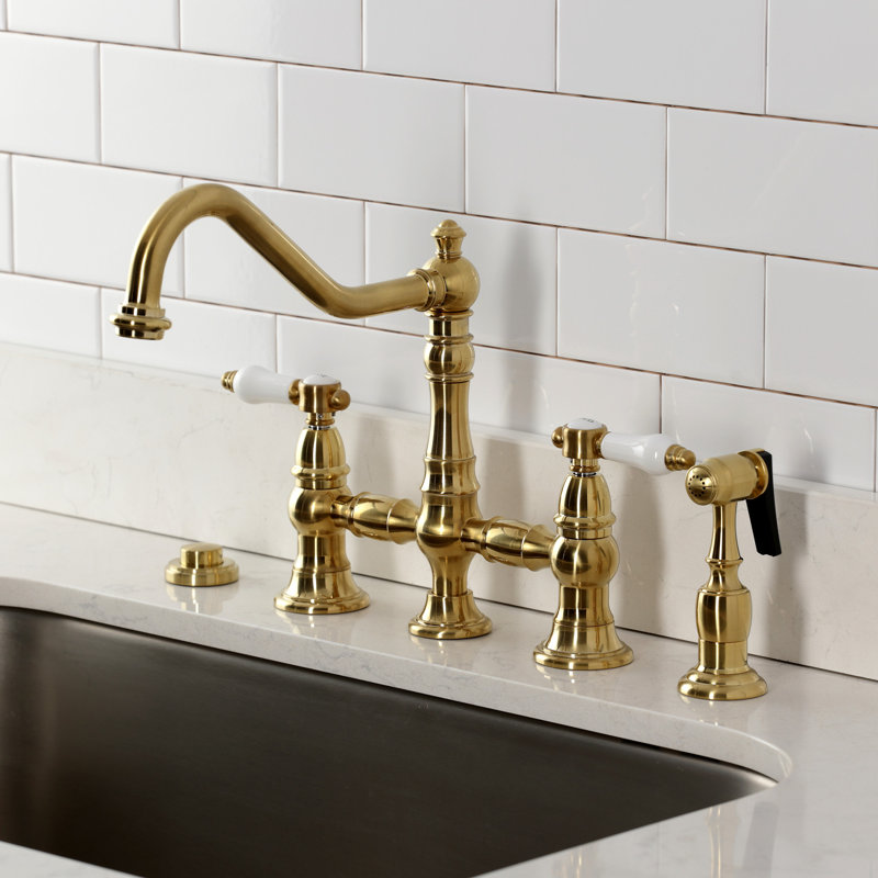 Kingston Brass Bel-Air Two-Handle 4-Hole Deck Mount Bridge Kitchen Faucet With Brass Side Sprayer, Brushed Brass
