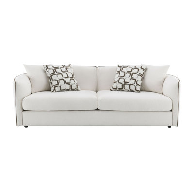 Canapé beige en chenille avec 4 coussins