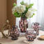 Vase d'appoint en verre transparent avec taches artistiques ambrées