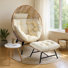 Fauteuil intérieur / extérieur en osier avec repose-pieds et coussins