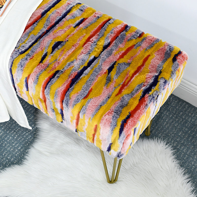 Mapoles Upholstered Ottoman, Orange Faux Fur