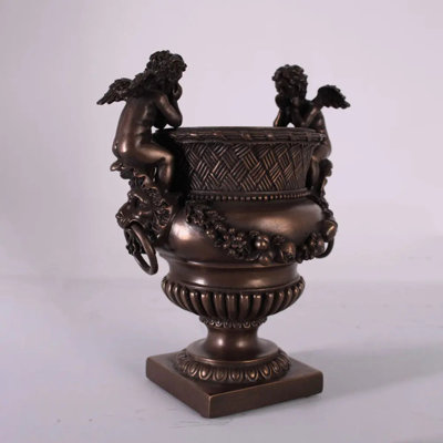 Statue de petits anges en bronze et urne lion