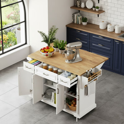 White Solid Wood Movable Island With Rubberwood Embossed Folding Tabletop, 4-Wheel Trolley, 4 Doors, 3 Drawers For Storage.