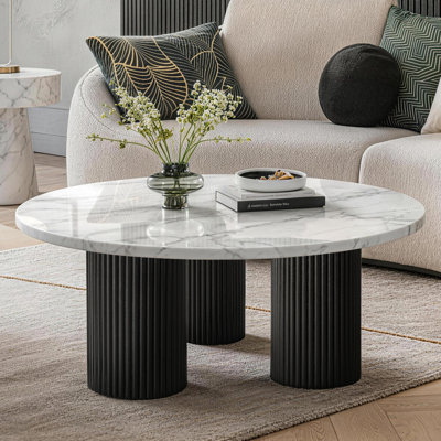 Table basse 39,4 "ronde en faux marbre avec base cannelée