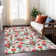 Machine Washable Indoor/Outdoor Christmas Nutcracker Xhevrie Ivory Rug