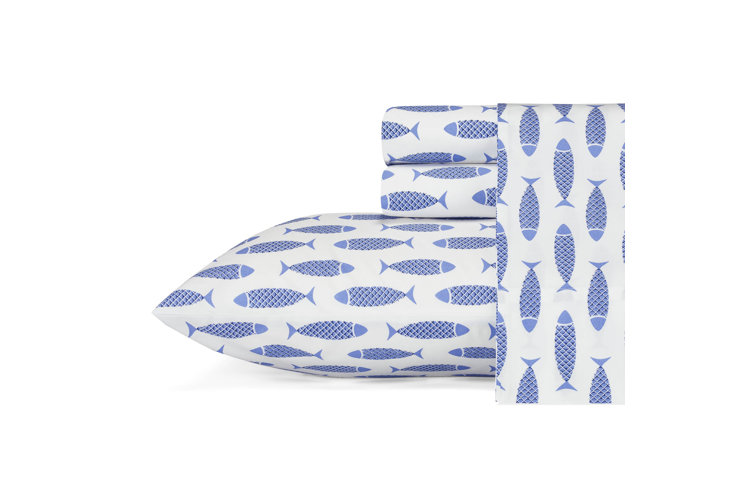 white bedding with blue fish pattern