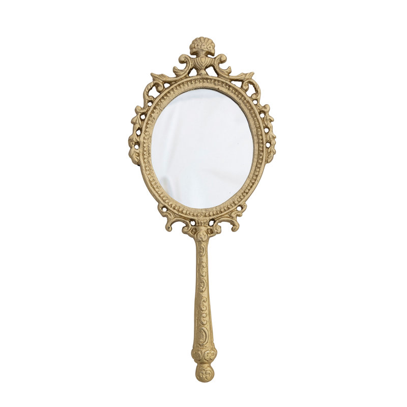 Miroir à main encadré en métal embossé