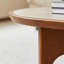 Table basse ovale en noyer fritté + bois manufacturé