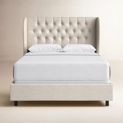 Tomey Upholstered Wingback Bed